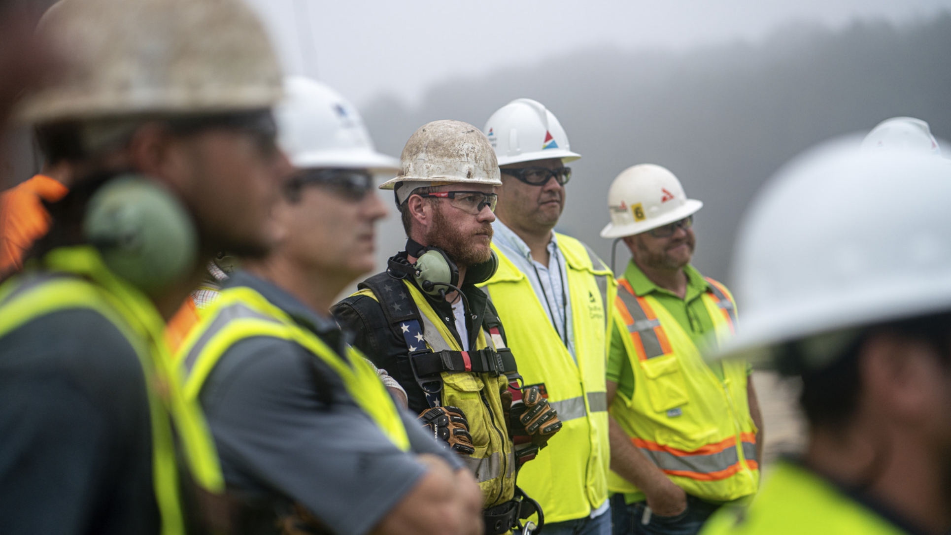 Matrix Service Company - EPC Capability Image - Men in hardhats on construction site.